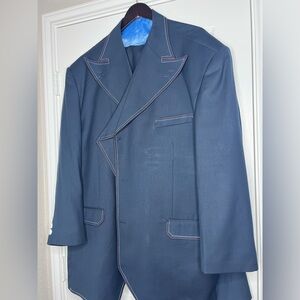 Blue suit with white and red lining